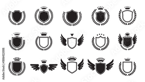 Set of black silhouette shields with crowns and laurel wreaths heraldry symbols isolated on white