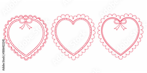Three delicate pink hearts with decorative borders and bows are displayed