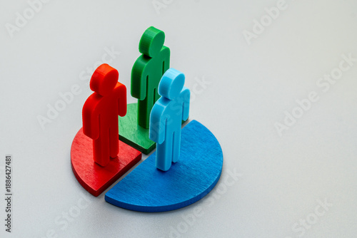 Human figures standing on separated pie chart segments. Population distribution, market segmentation, demographic target groups concept. Copy space for text.