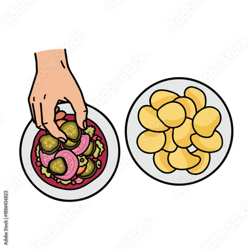 Hand picking pickles from a jar.