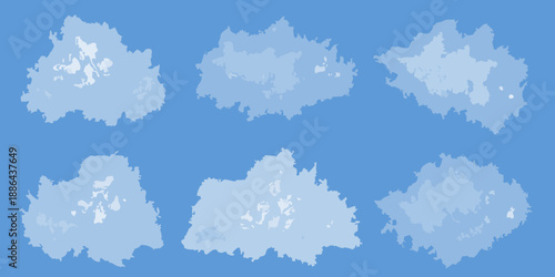 A collection of fluffy white clouds against a bright blue sky backdrop