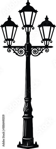 Black vintage street lamp post with three lights