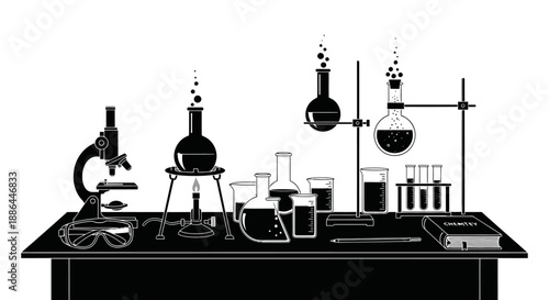 Scientific laboratory equipment on a table with experiments.