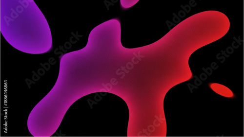 Vibrant liquid shapes in red and purple hues floating freely on a black background from a close-up viewpoint