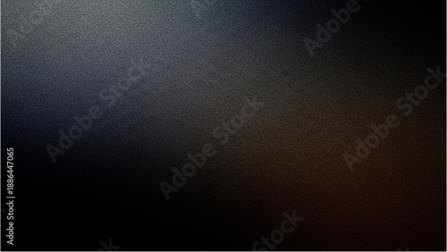 A dark metallic surface viewed from above with light reflection gradating to shadows