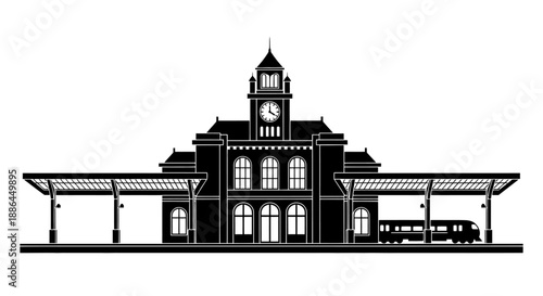 Vintage Train Station Building with Clock Tower and Platform.