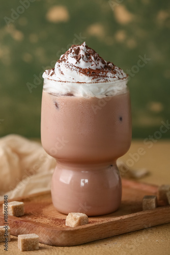 Glass of cocoa drink with w...