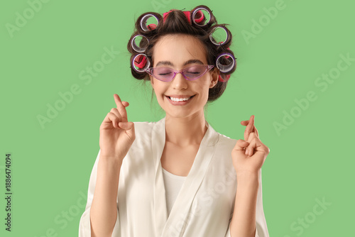 Young woman in robe with ha...