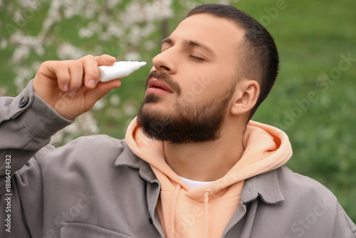 Sick young man with allergy...