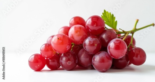 Fresh Red Grapes With Green Stem Isolated On White Background