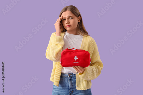 Sick young woman with first...