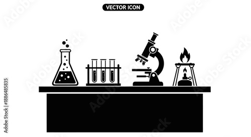 Laboratory equipment on a table with a Bunsen burner.