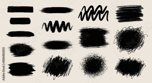 A collection of black brush stroke textures and scribbles on a beige background.