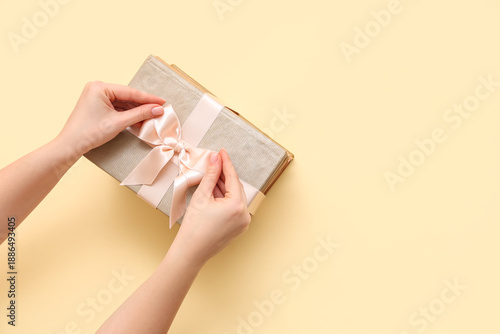Female hands with stack of ...