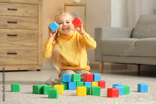 Cute little girl with plast...