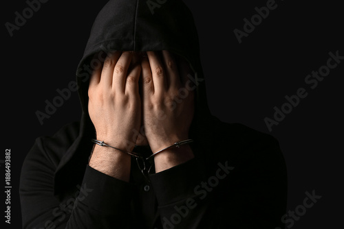 Young man in handcuffs clos...