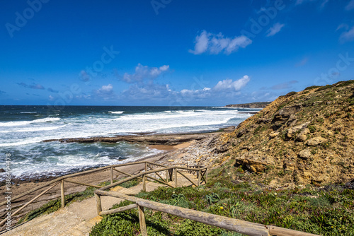 Matadouro beach in Ericeira, Portugal with beautiful touristic resorts, sandy beach and best surf conditions