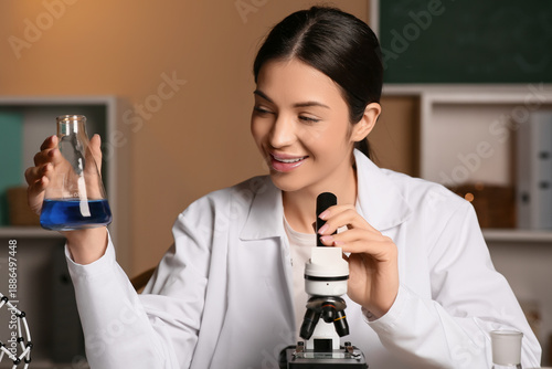 Female inventor with chemic...