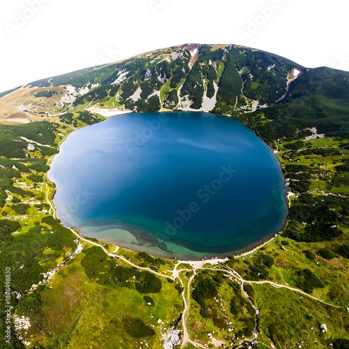 Aerial view of a deep blue mountain lake, surrounded by lush green vegetation and a high grassy peak behind