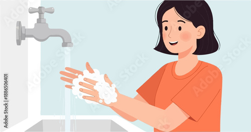 Person washing hands with soap under running water