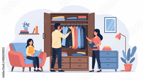 People organizing clothes in a wardrobe with a woman reading