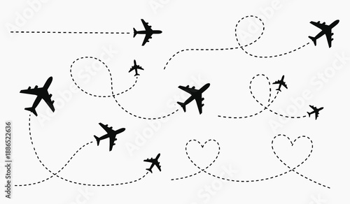 Silhouettes of airplanes following dotted paths with heart shaped trails