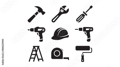 Various construction tools arranged neatly on a plain background from a straightforward view