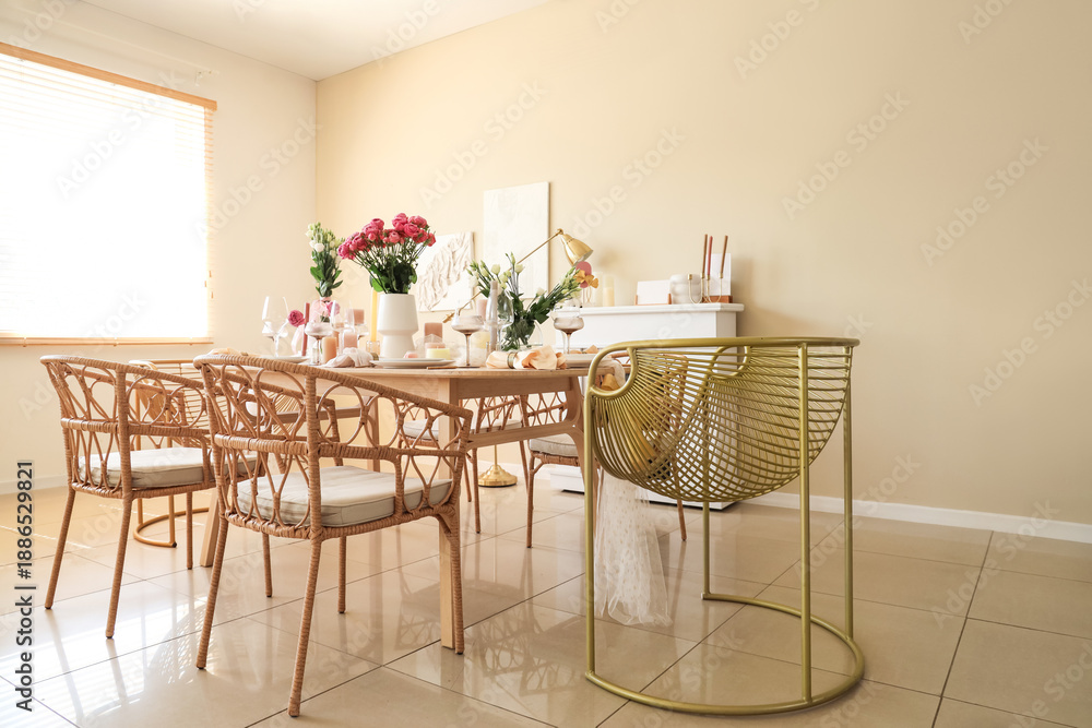 Fototapeta premium Beautiful table setting with flowers and candles for wedding celebration in room