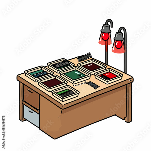 Professional darkroom equipment featuring chemical developer trays and dual red safety lamps for traditional black and white film processing in a home studio.