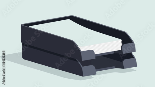 Stacks of white paper in a dark gray multi-tiered office tray