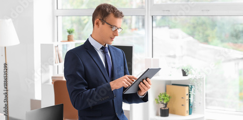 Handsome businessman workin...