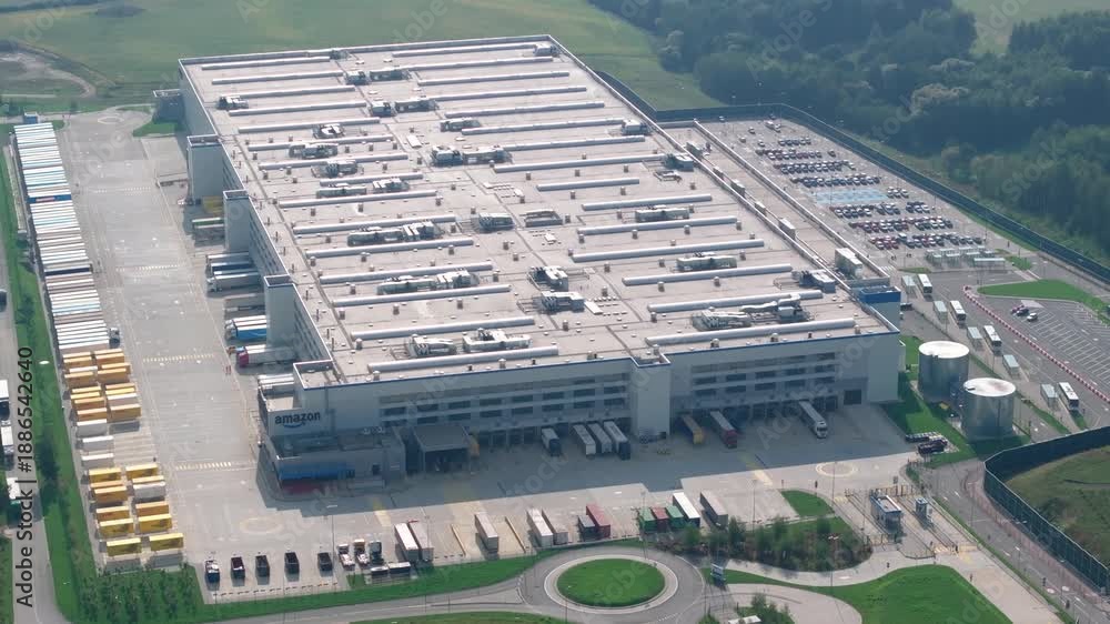 Amazon fulfillment center overview with delivery trucks and loading ...