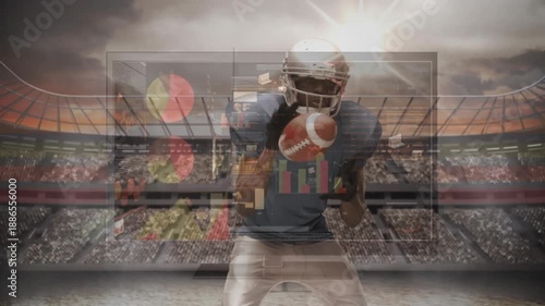 American football player tackling for ball in slow motion