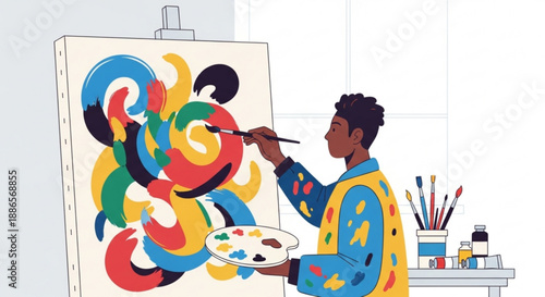 Artist painting colorful abstract art on canvas in studio