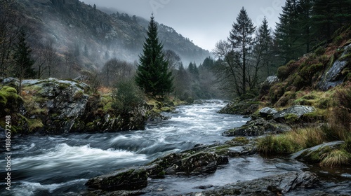 Silky waters carving a dramatic Welsh mountain valley landscape