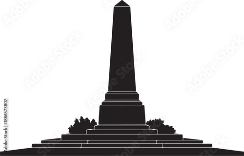 Black obelisk monument with steps and shrubs