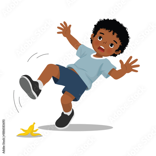 Little African boy falling down slip on banana peel