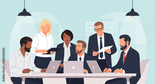 Professional Business Meeting: Diverse Corporate Team Collaborating on Strategy with Laptops in the Office.