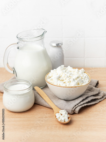 Fresh cottage cheese, milk, and yogurt creating a healthy breakfast