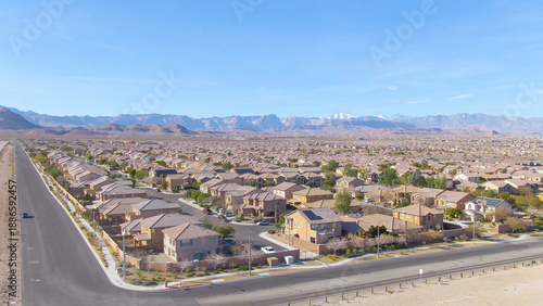 AERIAL: Spectacular shot of Las Vegas suburbs sprawling across the Mojave desert