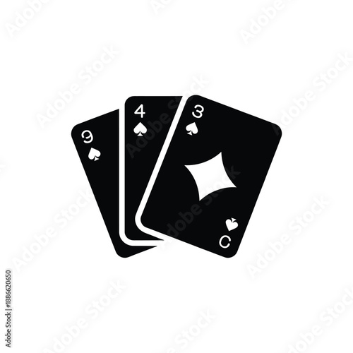 Black playing cards stacked together showing game elements and symbols
