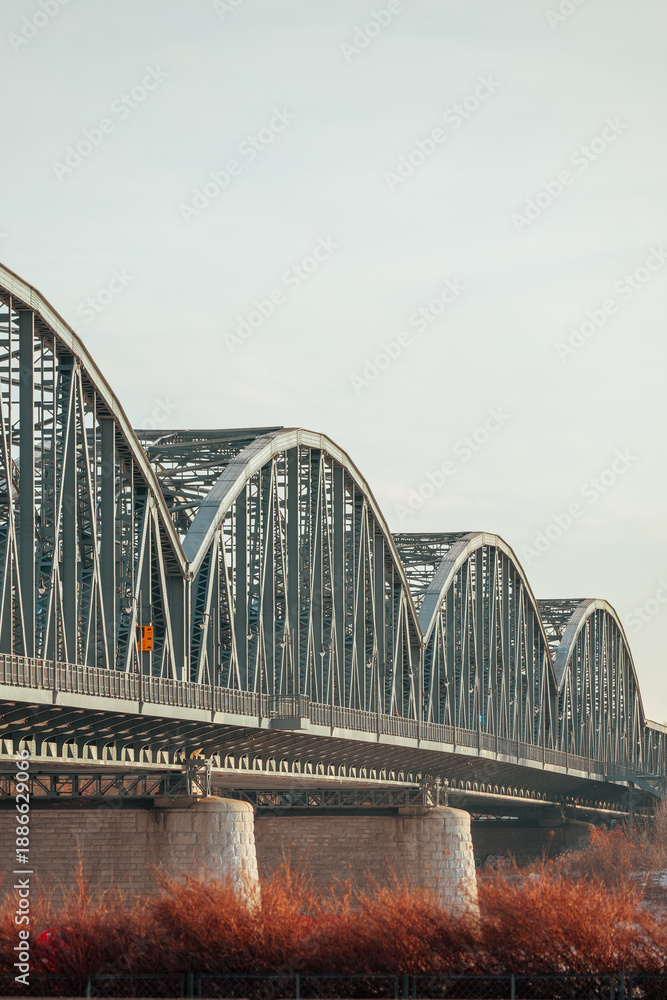 Obraz premium Elements of an iron road bridge in the city of Torun, Poland