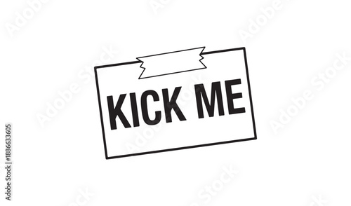 Funny prank sign 'KICK ME' attached with tape to a surface, for April Fools' Day or practical jokes