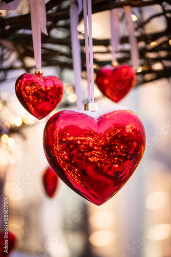 Bild auf Leinwand A red heart in the city on Valentine's Day as a backdrop for the holiday