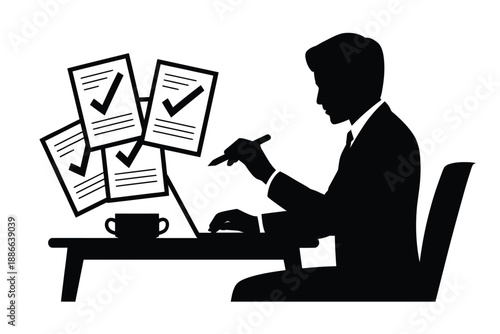 Man reviewing documents signing papers and completing tasks at a desk