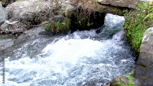 Slow motion shot of water fall splashes in hilly area of Pakistan	
