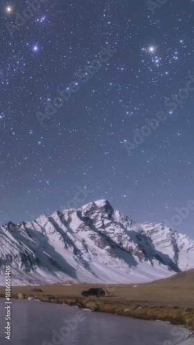 4K Vertical Time-lapse of Milky Way and Starry Sky Over Snow-capped Mountains in Tibet