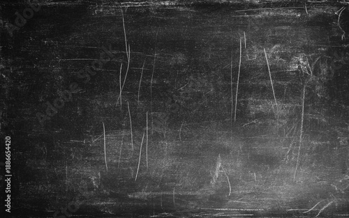 Blank blackboard background with chalk rubbed out. Black Blackboard Chalkboard texture. Empty blank dark dirty school board wall banner background