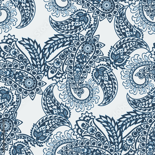 Boho-style vector seamless paisley pattern with flowers, great for fashion, wrapping paper, and home decor