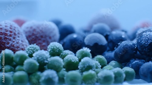 Wallpaper Mural Frozen mixed berries including blueberries, strawberries, and green currants displayed on a surface Torontodigital.ca